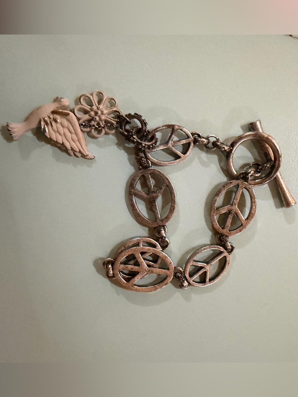 Lucky Brand Peace Sign Charm Bracelet with Wing and Flower Charms - Silver